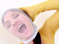 Leony Aprill nylon mask distorted cuddly face