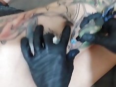 Tattoo made with anal plug on the ass