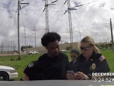 Two nasty female police officers suck large penis of a black felon then makes him licks chick's ass